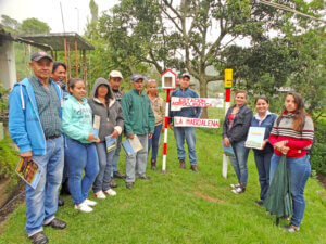 Local farmers with their informational soil cards.